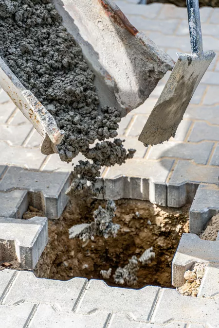 Holzhaus Fundamente erstellen mit einem Erdlochausheber