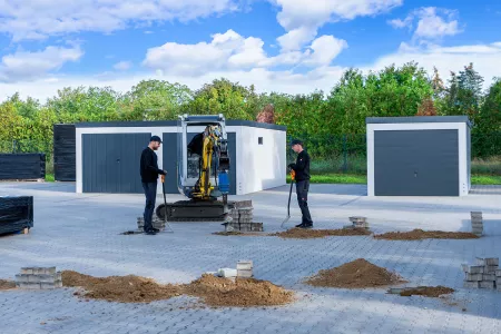 Gartenhaus Garagen Fundamente erstellen mit einem Minibagger und Erdbohrer