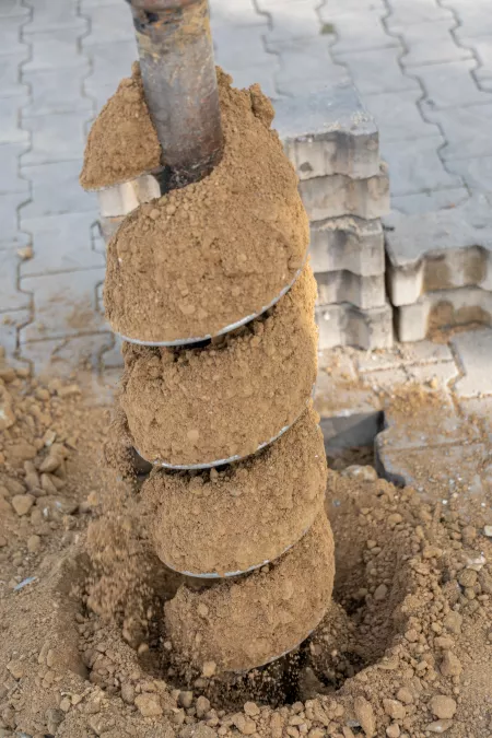 Gartenhaus Garagen Fundamente erstellen mit einem Minibagger und Erdbohrer