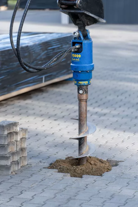 Gartenhaus Garagen Fundamente erstellen mit einem Minibagger und Erdbohrer