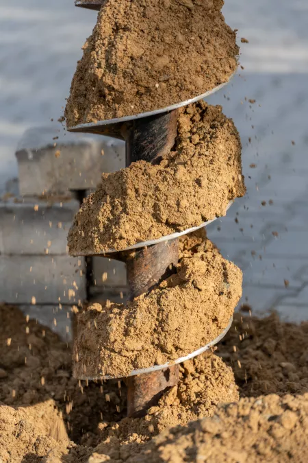 Gartenhaus Garagen Fundamente erstellen mit einem Minibagger und Erdbohrer