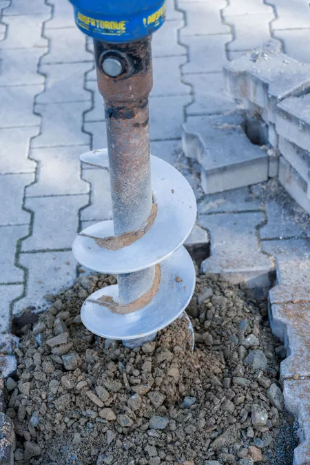 Gartenhaus Garagen Fundamente erstellen mit einem Minibagger und Erdbohrer